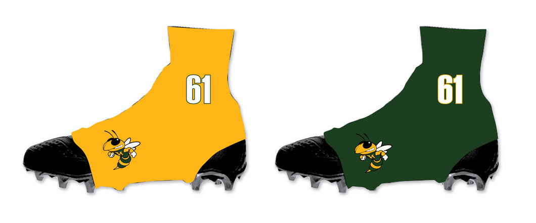 green and yellow football cleats