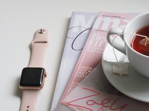 Stack of magazines on table