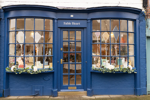 blue shop facade fable heart