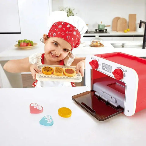 https://cdn.shopify.com/s/files/1/2092/2827/files/Hape-My-Baking-Oven-with-Magic-Cookies-Hape-Toy-Market-44373767_large.jpg?v=1699804486