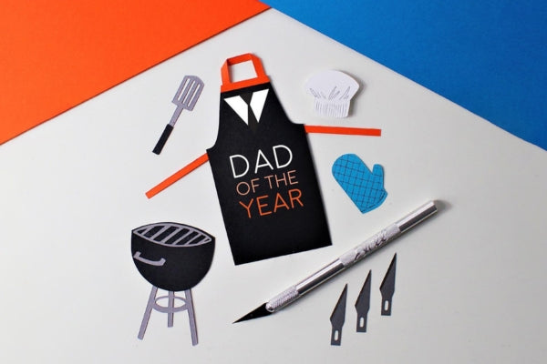 Handmade grilled-theme decorations for a Father's Day Card.