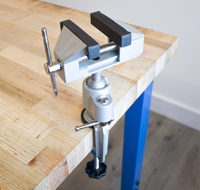 a bench vise clamped to a bench