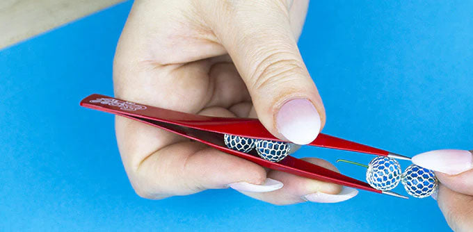 a pair of tweezers