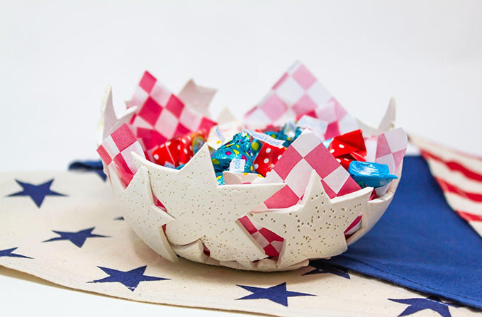 a star bangled bowl filled with candy