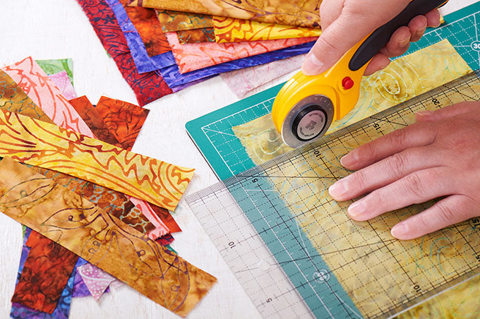 cutting fabric pieces