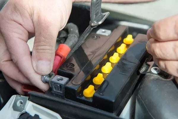 Disconnect motorcycle battery