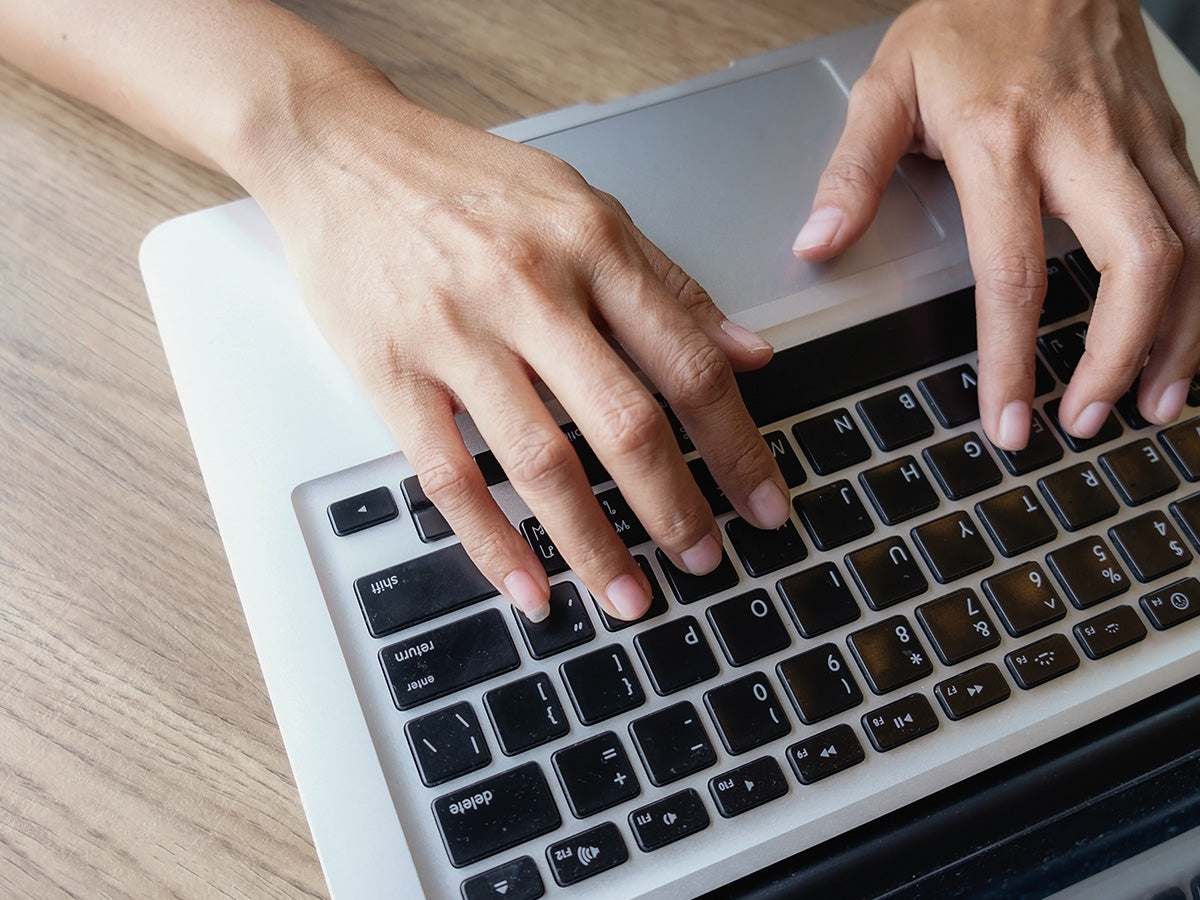 Image of hands on a keyboard