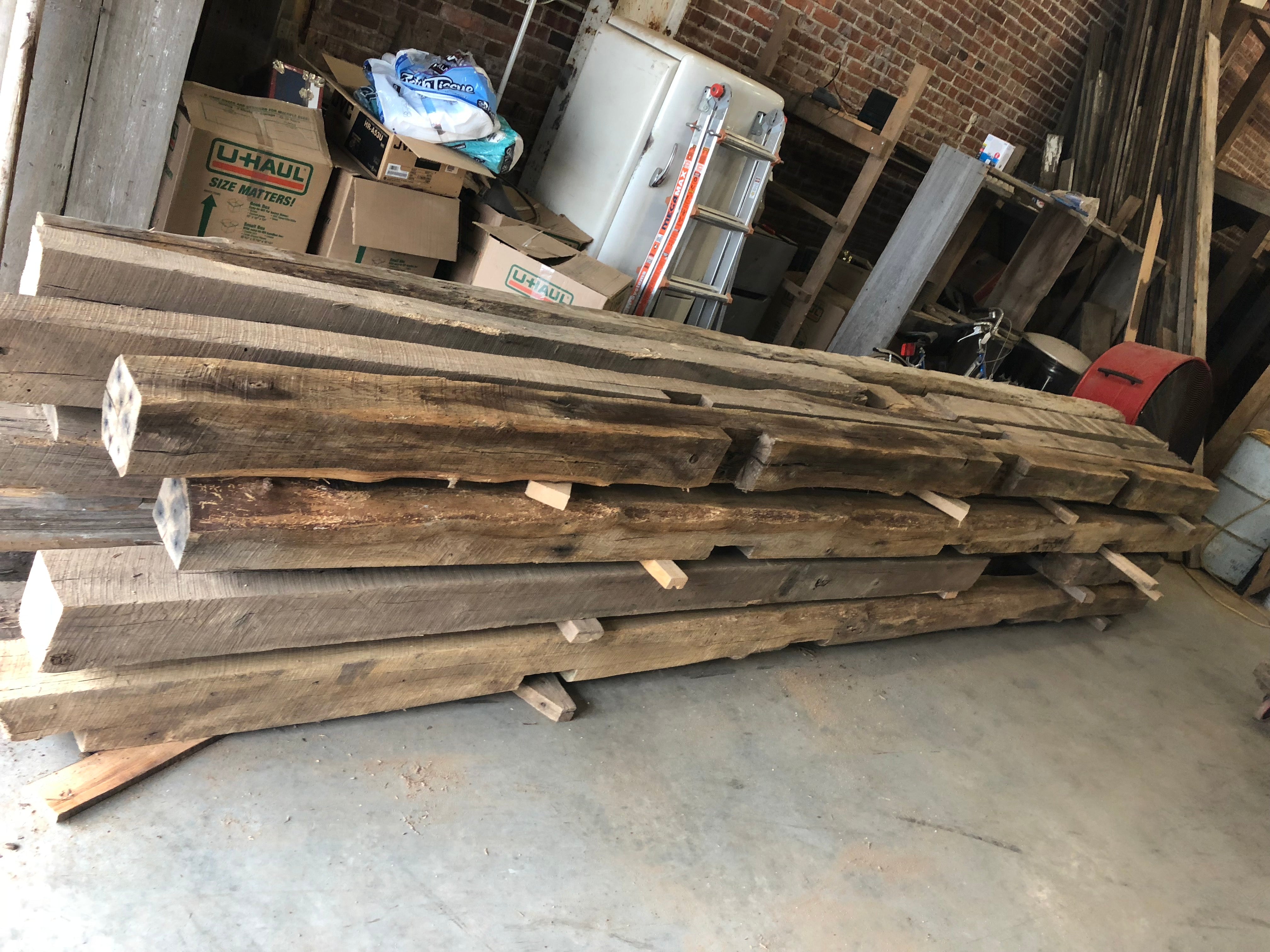 Antique oak barn beams from Elmwood Missouri barn. City Limit