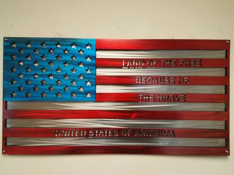 home of the free because of the brave metal sculpture