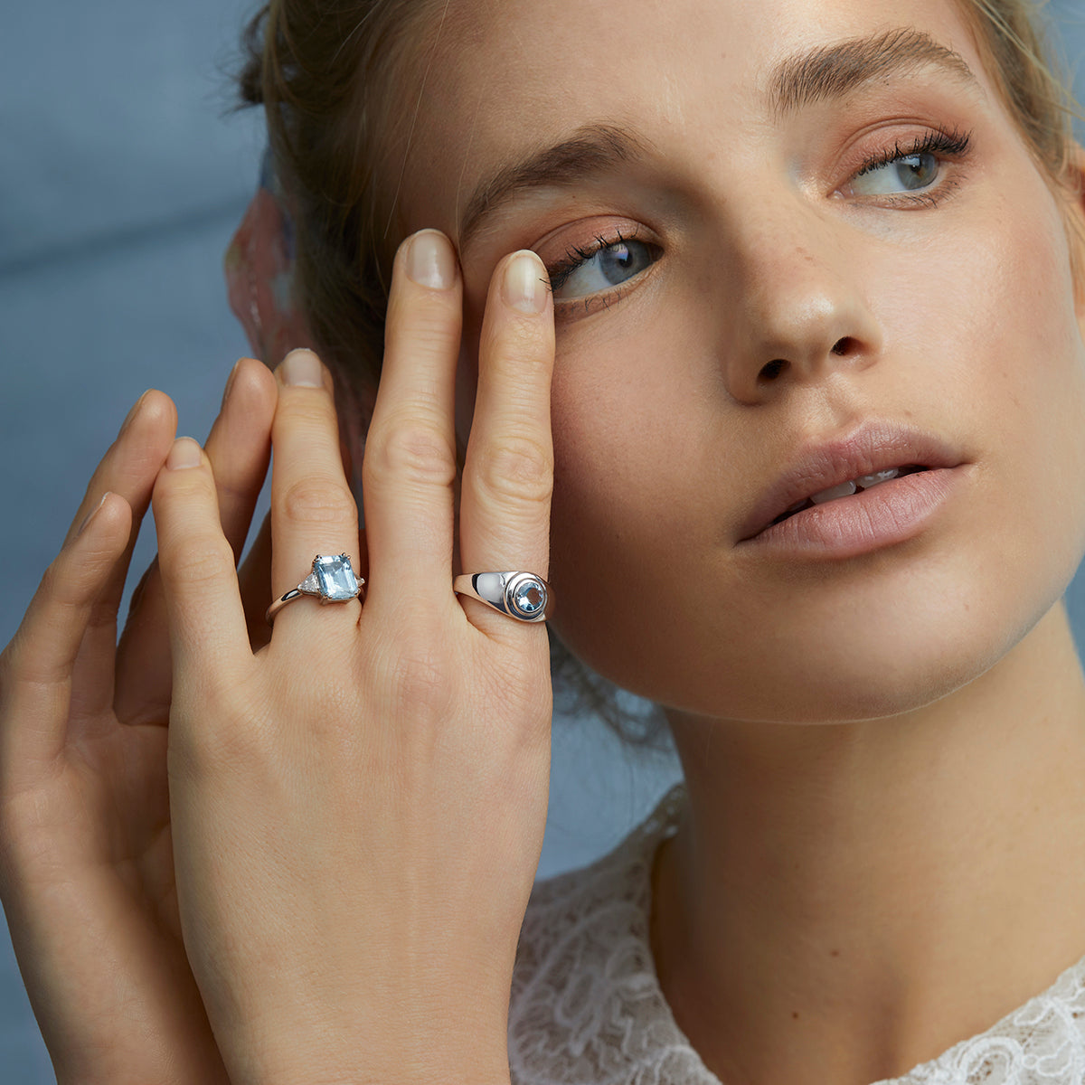 Trillion Cut Aquamarine and Oval Diamond Ring in Platinum : Arden Jewelers
