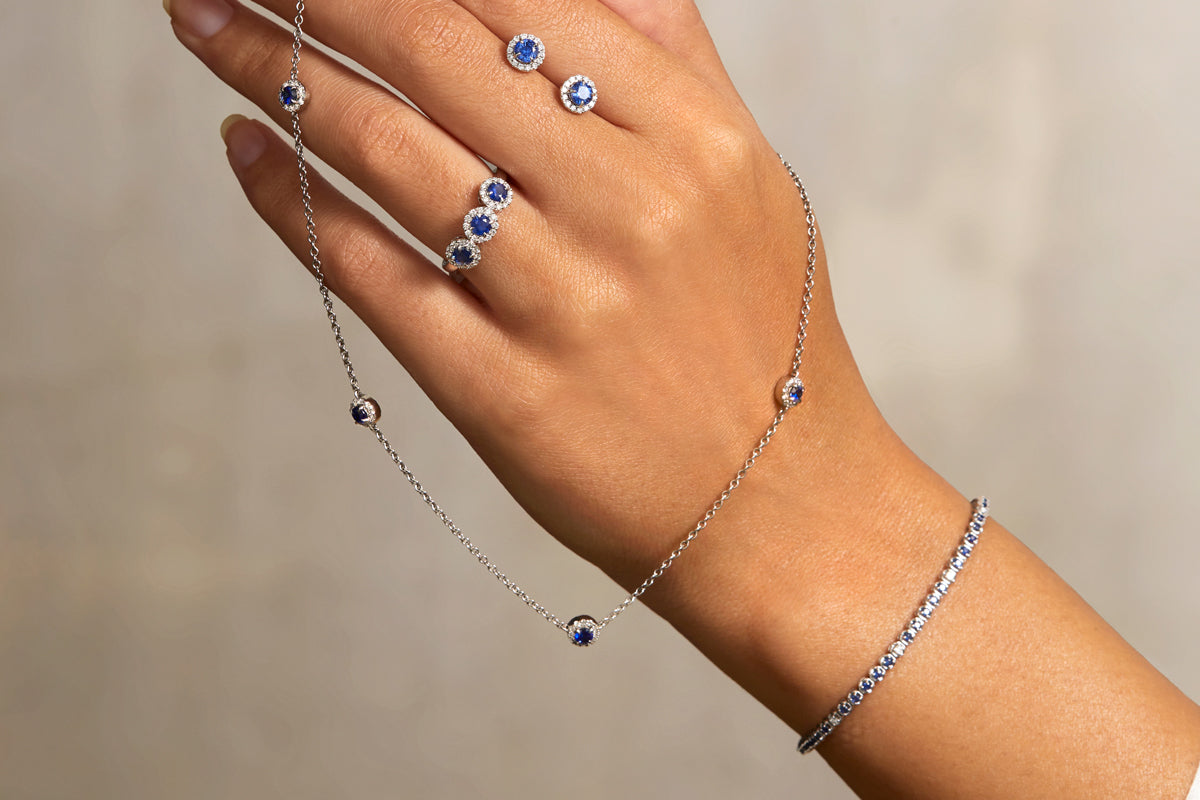 blue sapphire tennis bracelets stacked by Fenton (luxury quality jewellers with B Corp status)