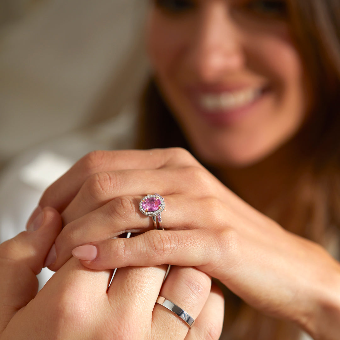 Woman wearing Pink Sapphire and Diamond Vintage engagement ring from Fenton