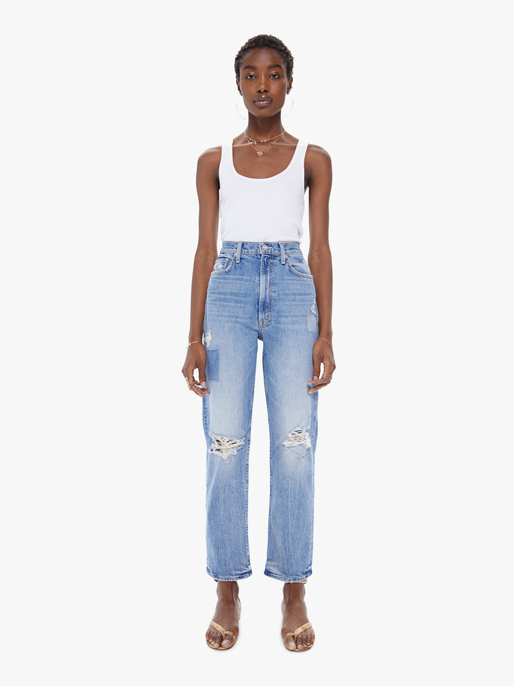 Front view of a women's light blue high waisted straight leg jean with ...