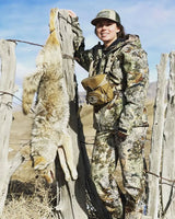 woman-holding-hunted-dog