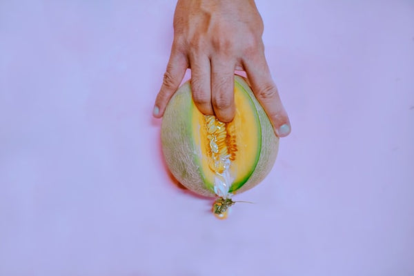 fingers in melon