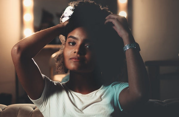 confident woman with hands in her hair