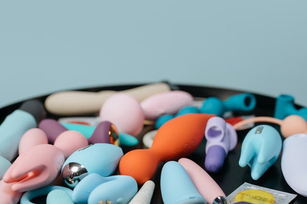 pile of vibrators on a table