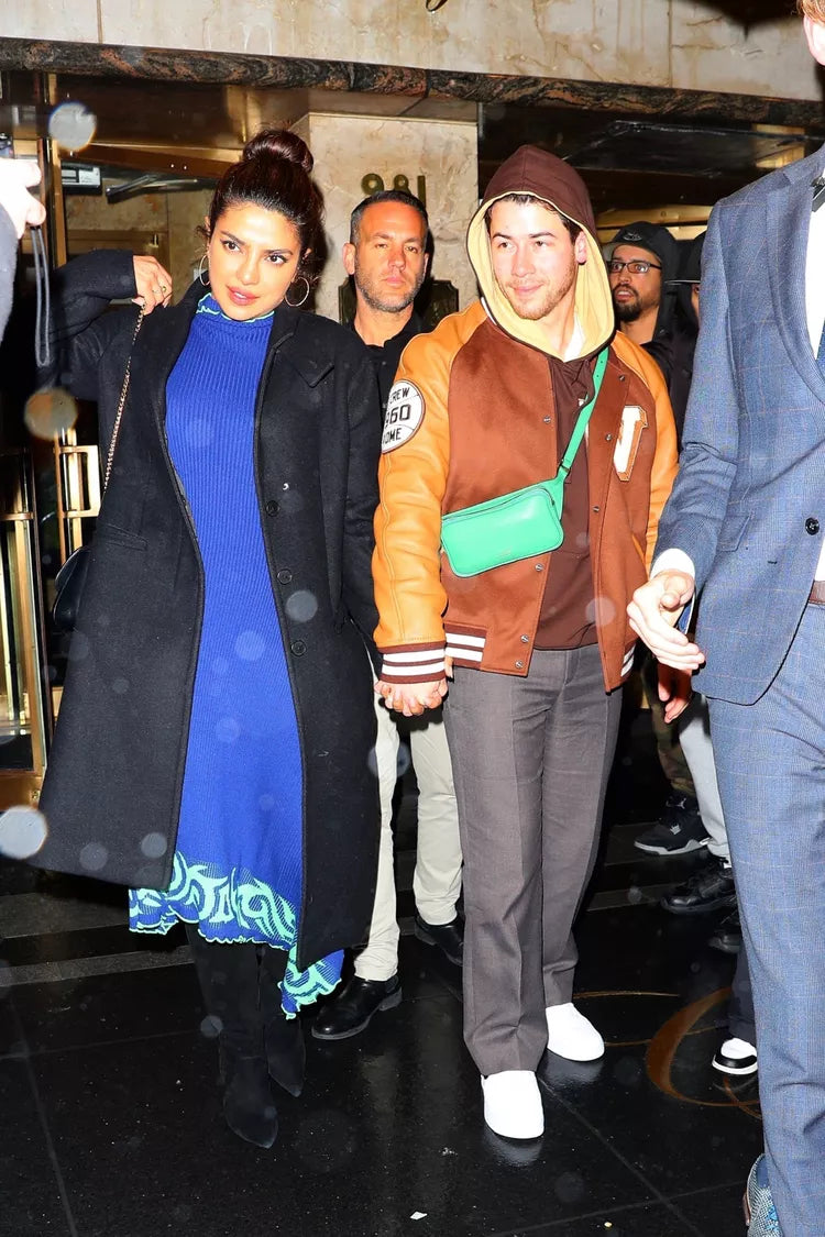 Nick Jonas Expertly Coordinated His Man-Bag With Priyanka Chopra's Knitted Dress