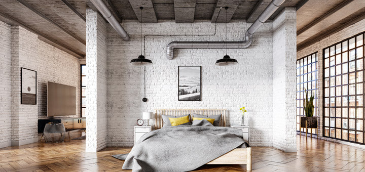 dormitorio con tuberías estilo industrial