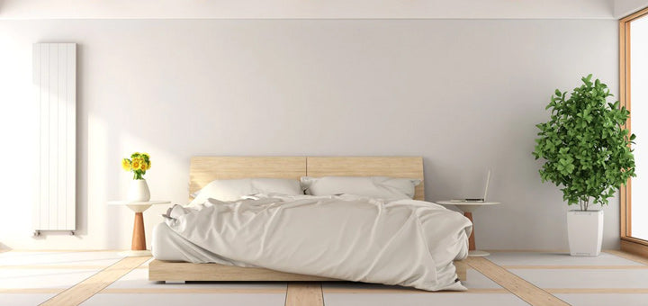 cama blanca con paredes blanca 
