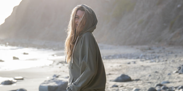 women in pastel sweatshirt