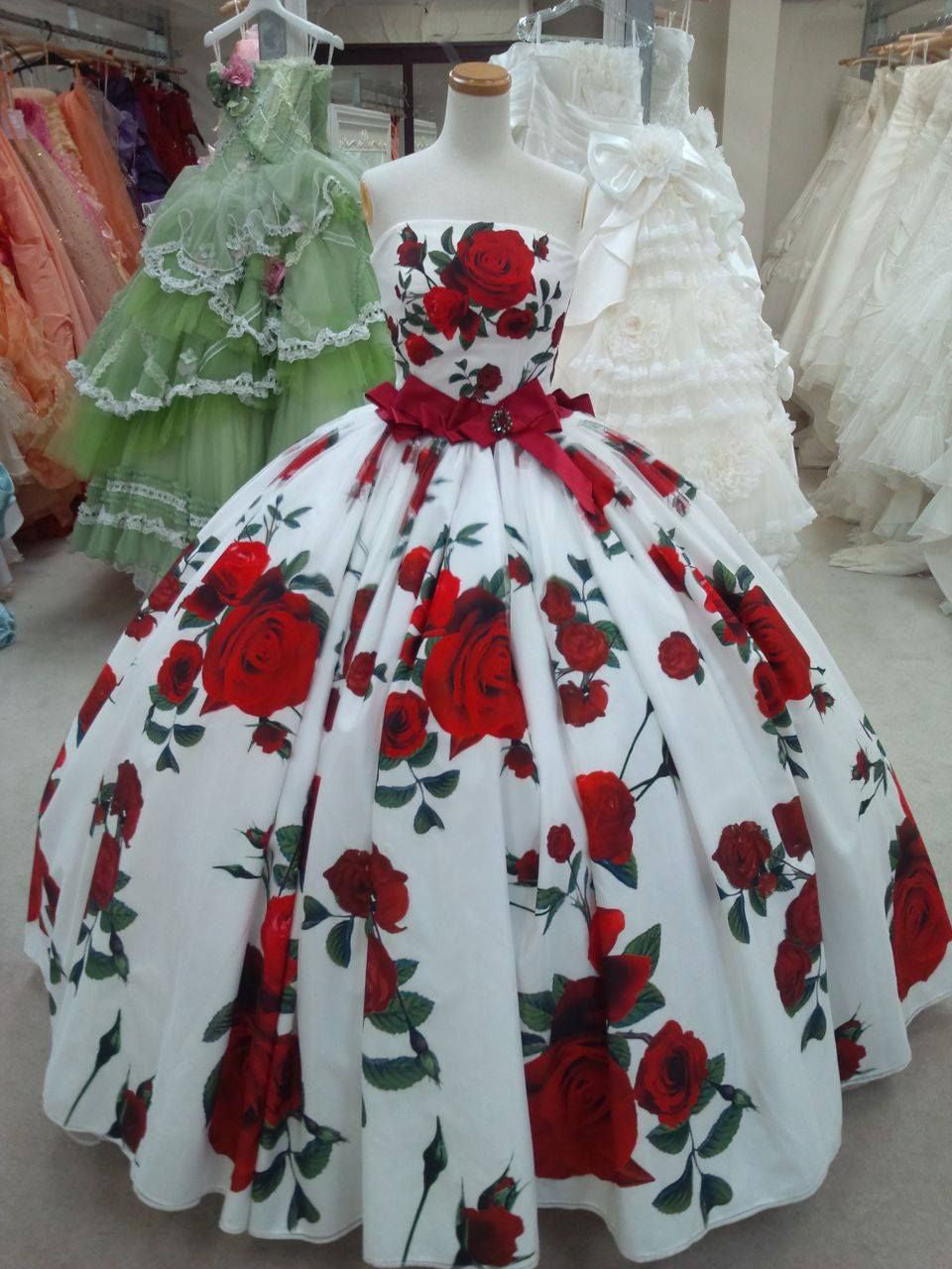 white prom dress with red roses