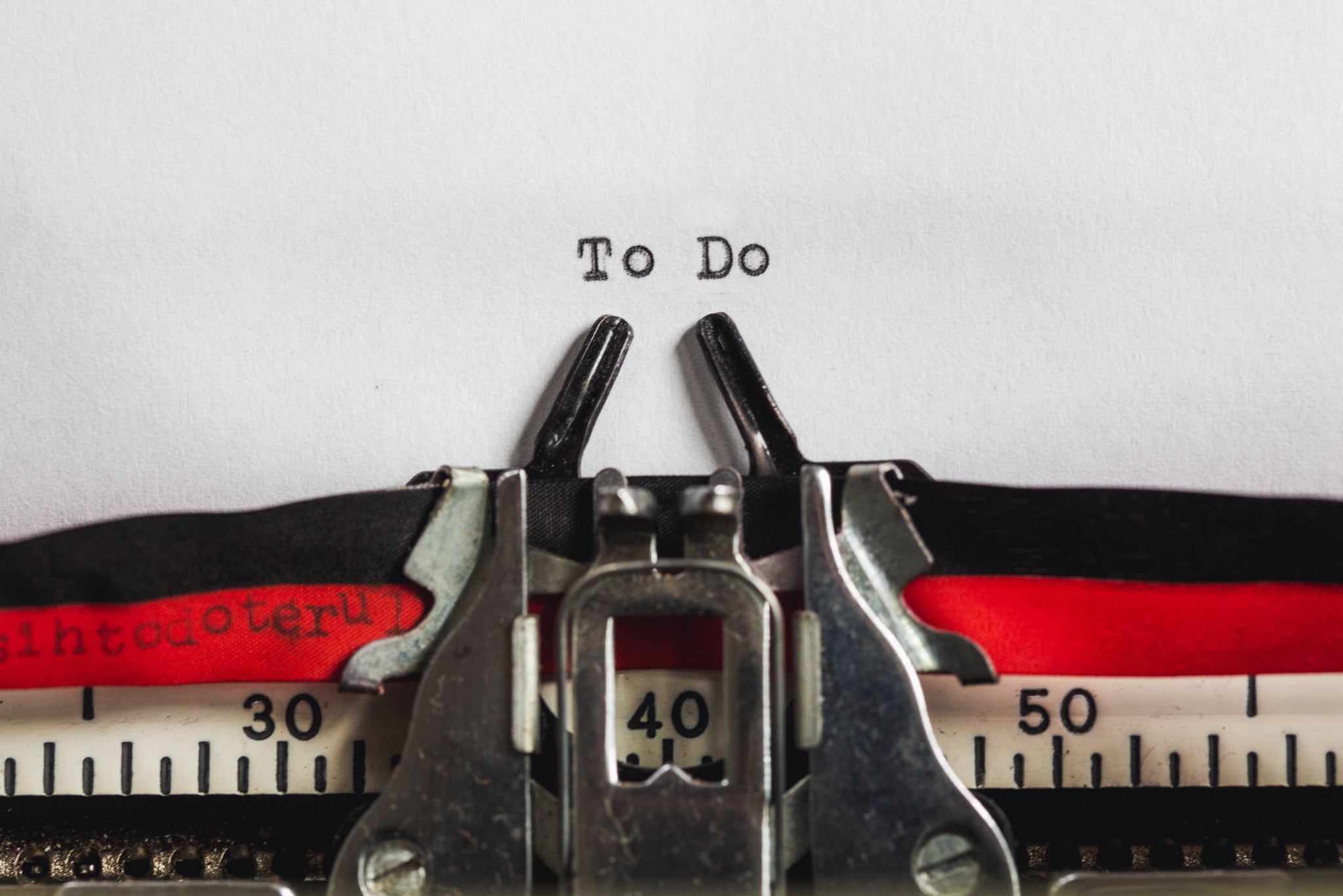 How To Combat Stress by Emptying a Kitchen Drawer. A typing machine writing “to do”