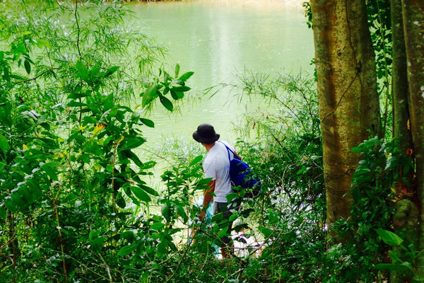 Arriving by canoe at Carmelita Gardens, Cayo District, Belize