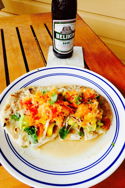 Cayo District, Belize, Pupusas and habanero salsa from the market with John's homemade green curry & papaya salad, with Belikin beer 