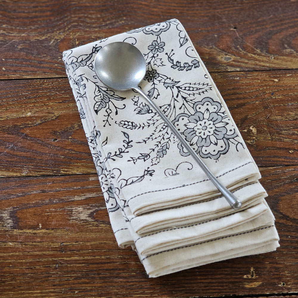 https://cdn.shopify.com/s/files/1/2101/2541/files/Rustic-Stainless-Soup-Spoon-with-Block-Print-Napkins_1600x.jpg?v=1683034626