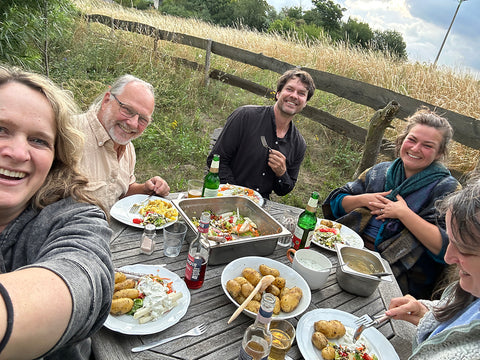 feeltone team eating a meal outdoors