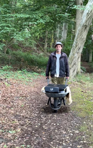 Audio Recorder Mo with a wheelbarrow full of gear