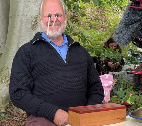 Ingo Böhme makes a visual joke with the drum mallets in his eyes