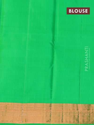 Pure Kanjivaram silk saree dual shade of pinkish orange and green with paisley zari woven border and zari woven border
