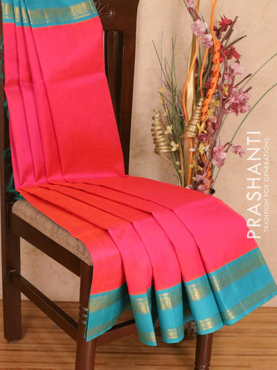 Silk cotton saree dual shade of pink and teal blue with plain body and paisley zari woven rettapet korvai border