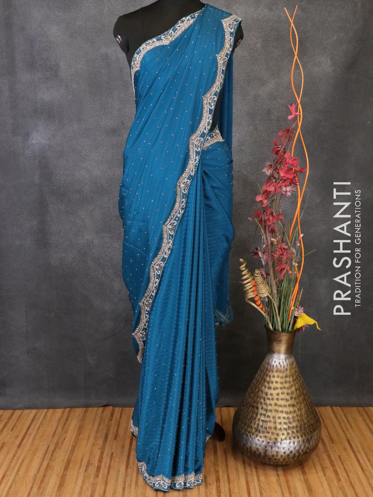 Peacock Blue Zari Embroidered Georgette Saree