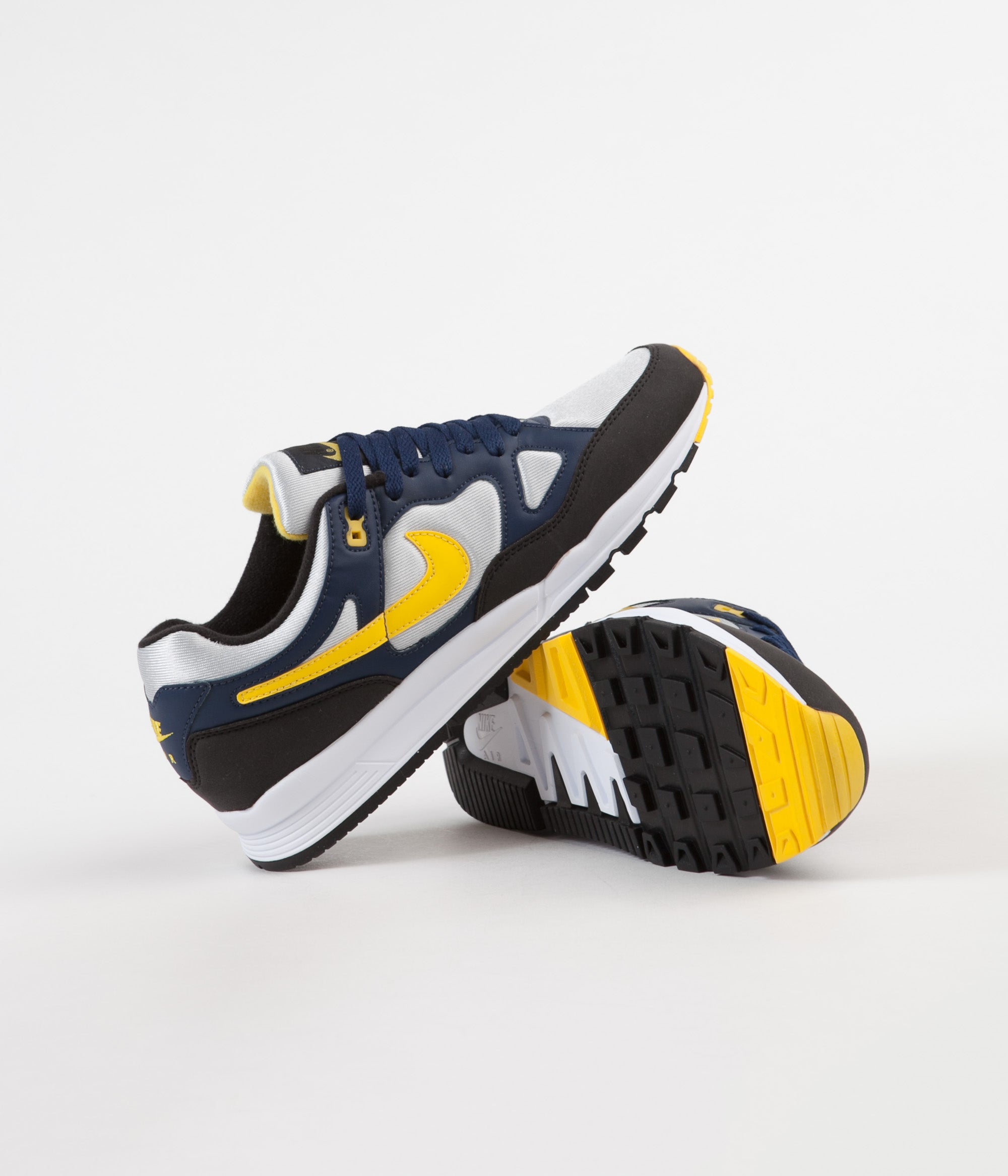 nike yellow black shoes