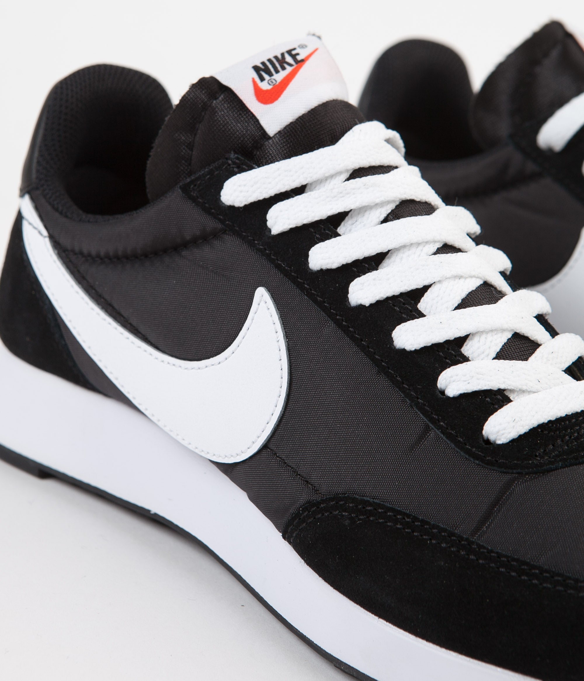 nike black white and orange