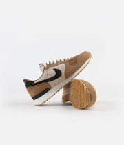 nike air vortex golden beige