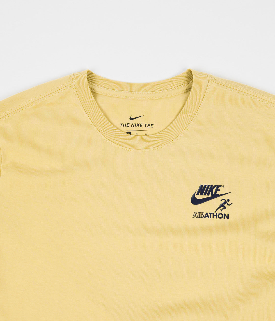 nike mustard yellow shirt