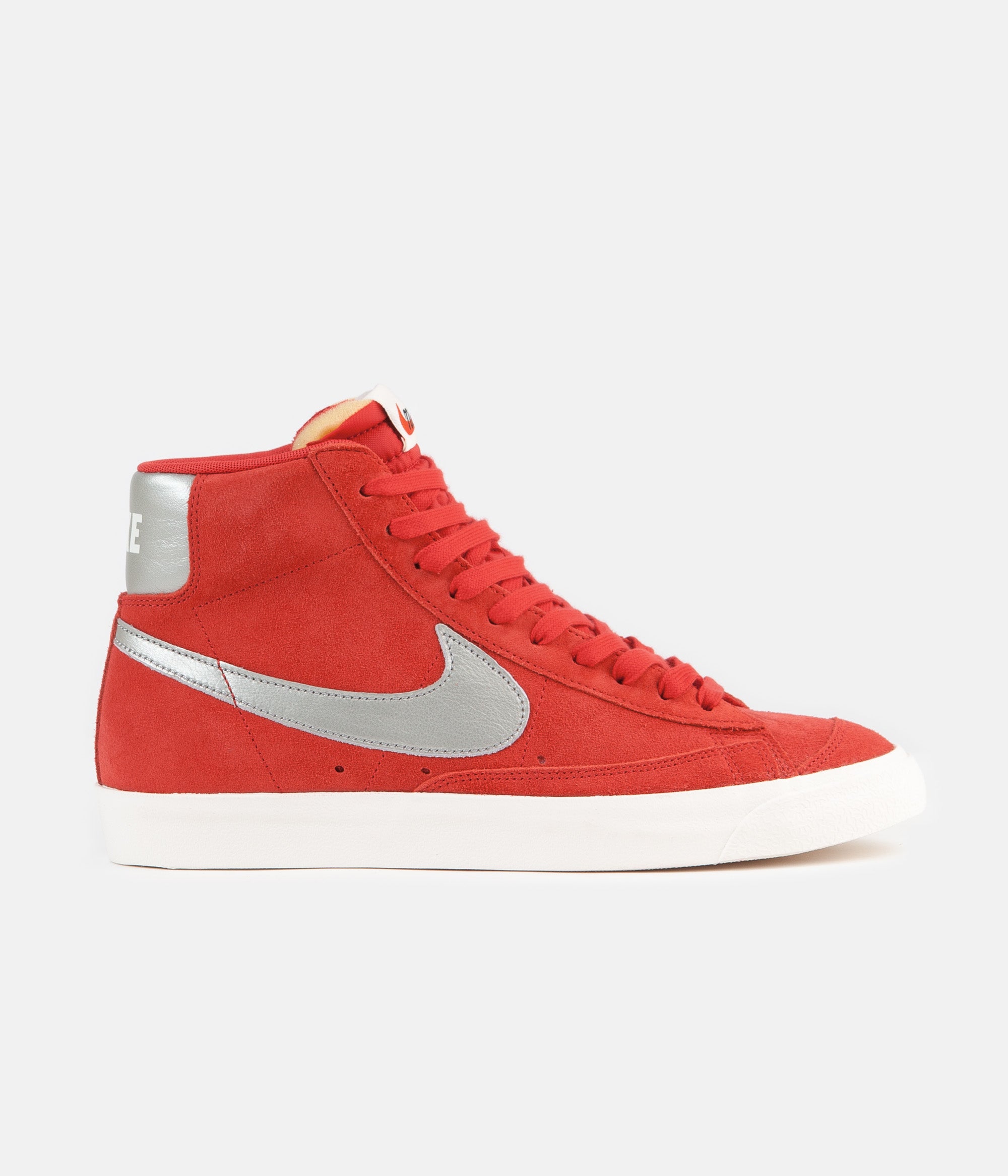 white and red nike blazers