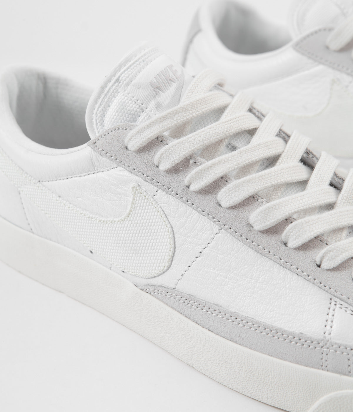 white nike leather shoes