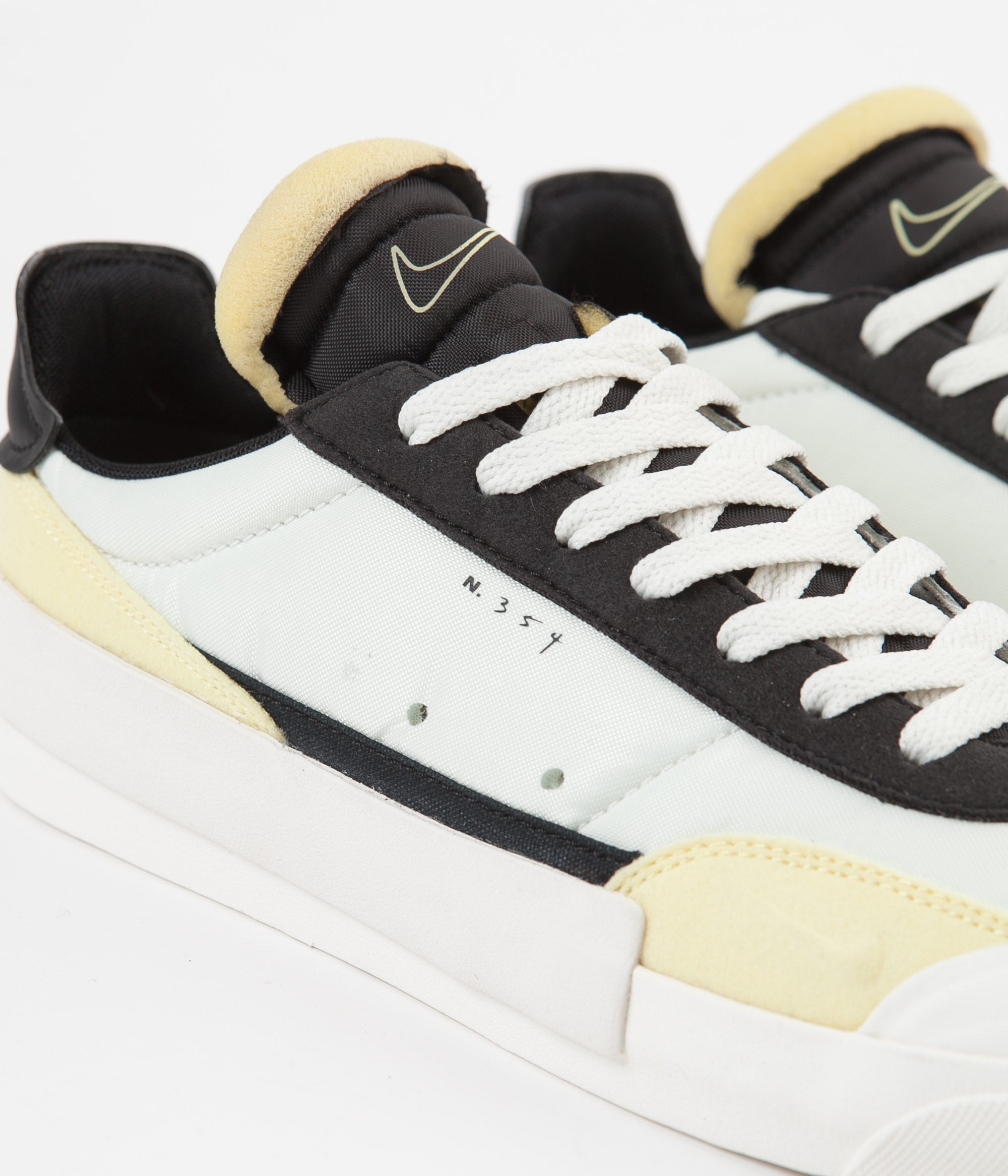 nike drop type lx yellow