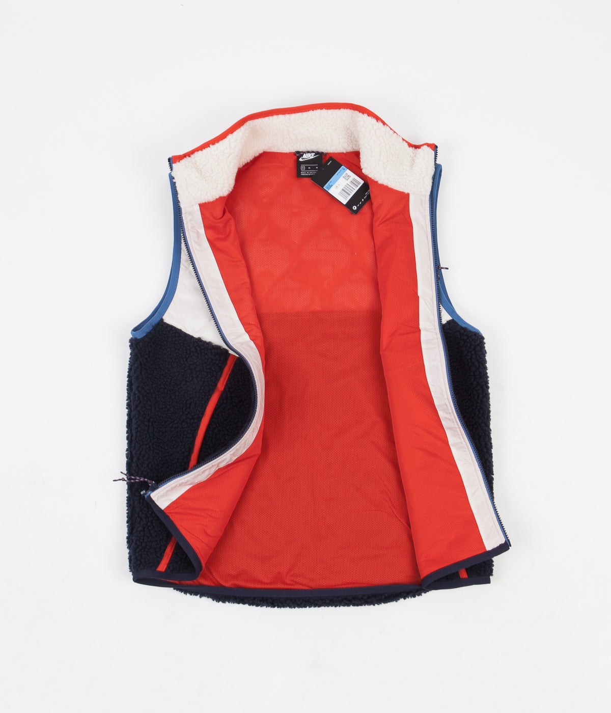 red nike vest