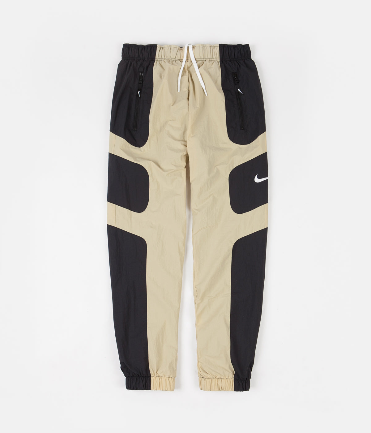 white and gold nike pants