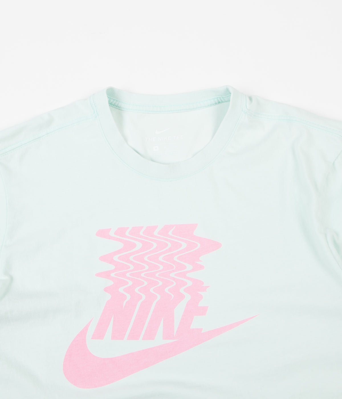 pink and teal nike shirt