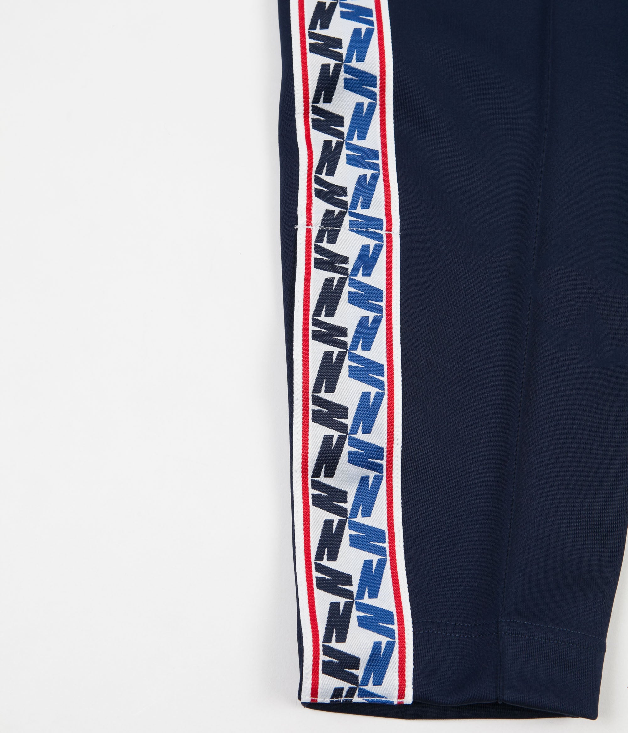 nike sportswear taped track pant