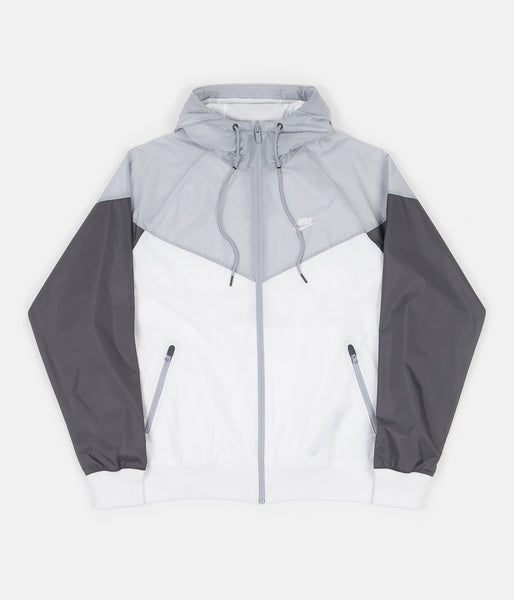 grey and white nike jacket