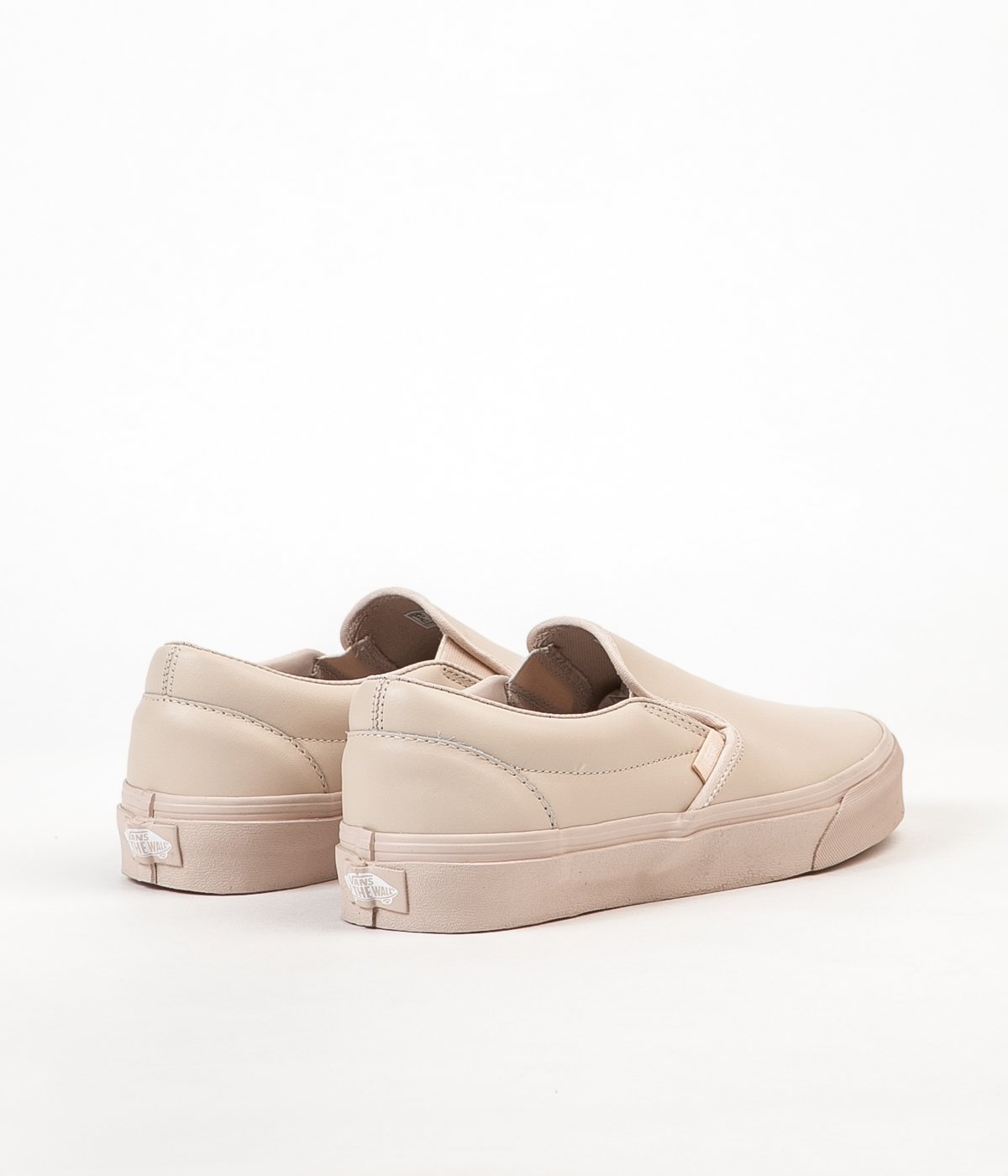 vans beige leather slip ons