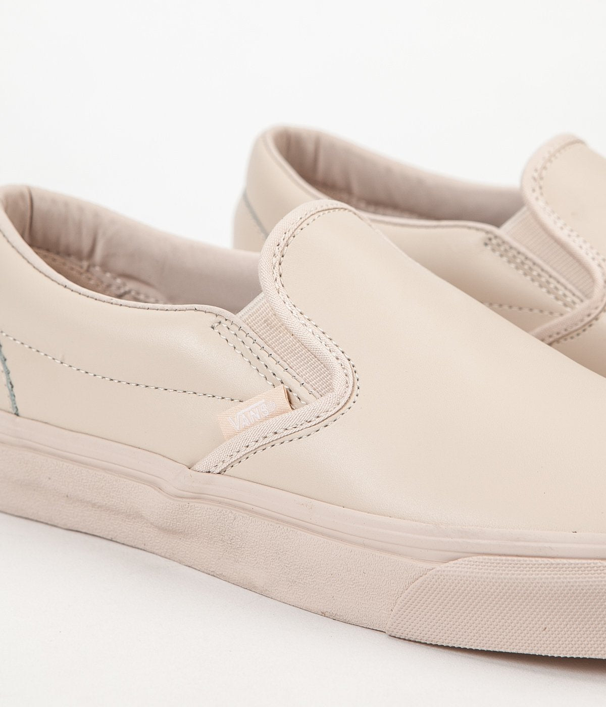 tan leather slip on vans